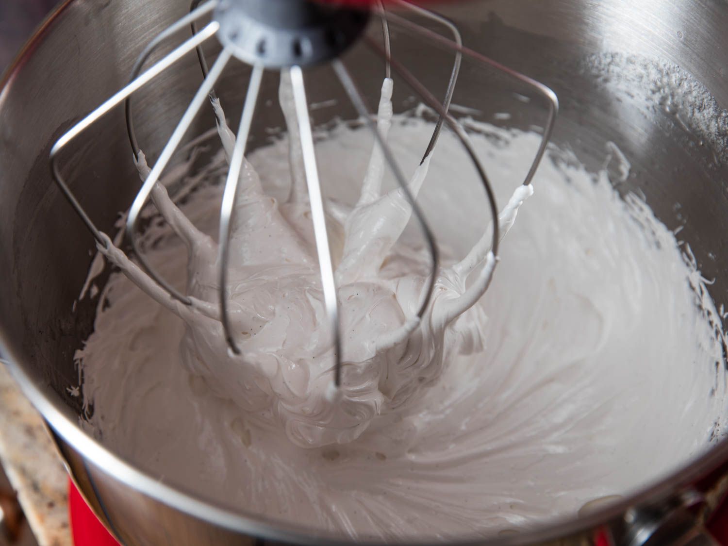 Egg whites whipped until light and fluffy in a stand mixer.
