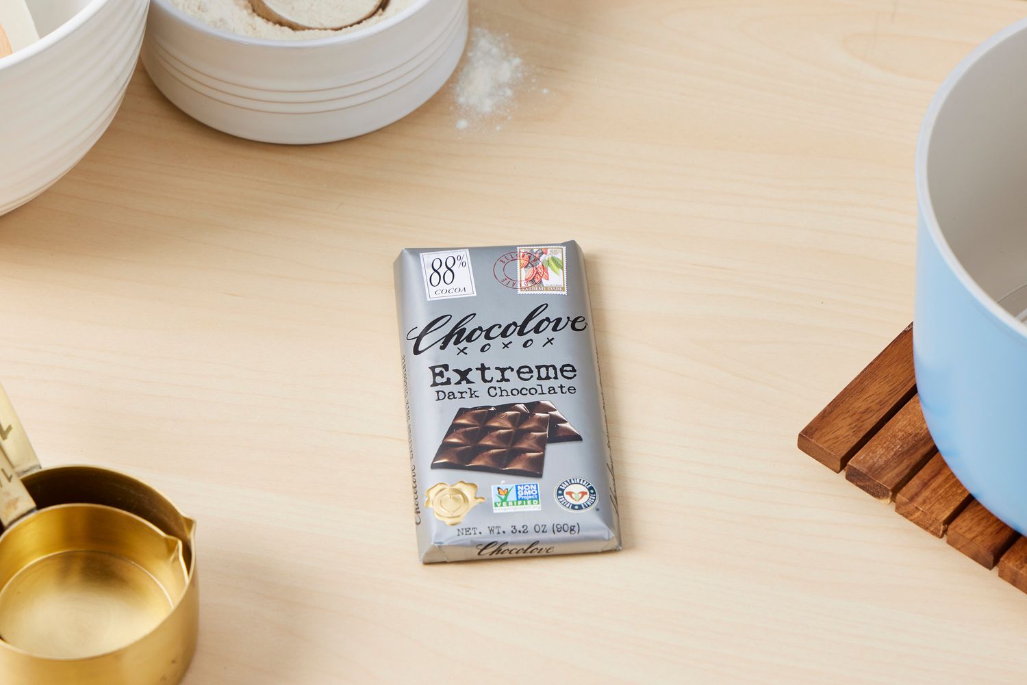 An 88% extreme dark chocolate bar on a wooden surface