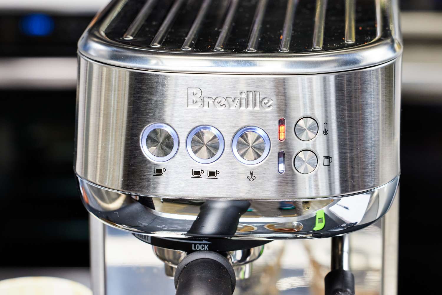 Closeup of Breville Bambino Plus Espresso Machine control panel buttons