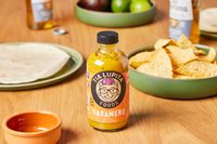 Tia Lupita Habanero Hot Sauce next to bowl of chips
