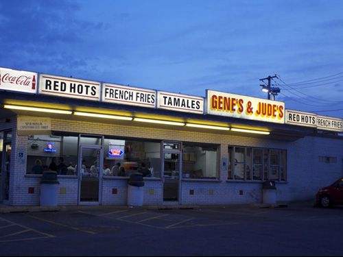 Photo of Gene's and Jude's storefront at dusk.