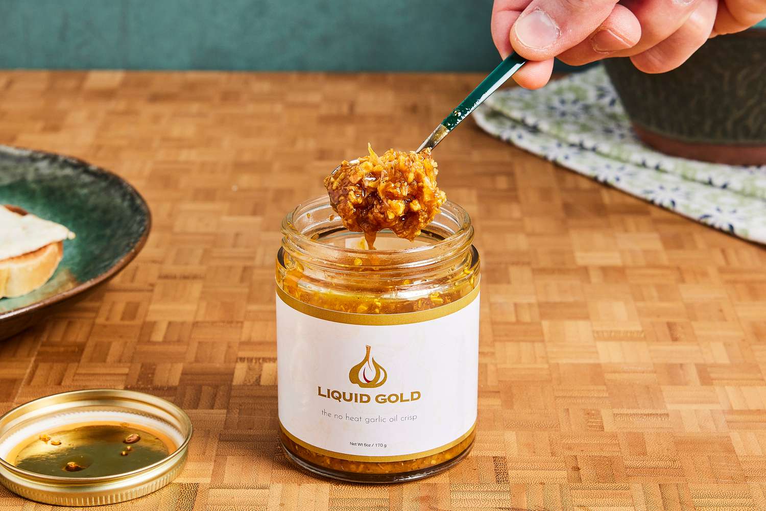 Liquid Gold 6oz being scooped