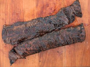 Two marinated and grilled skirt steaks.