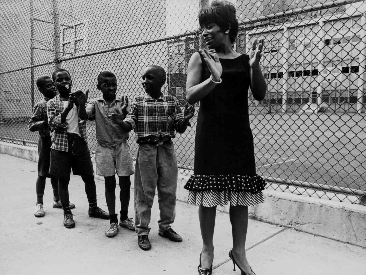 Shirley Ellis singing with children