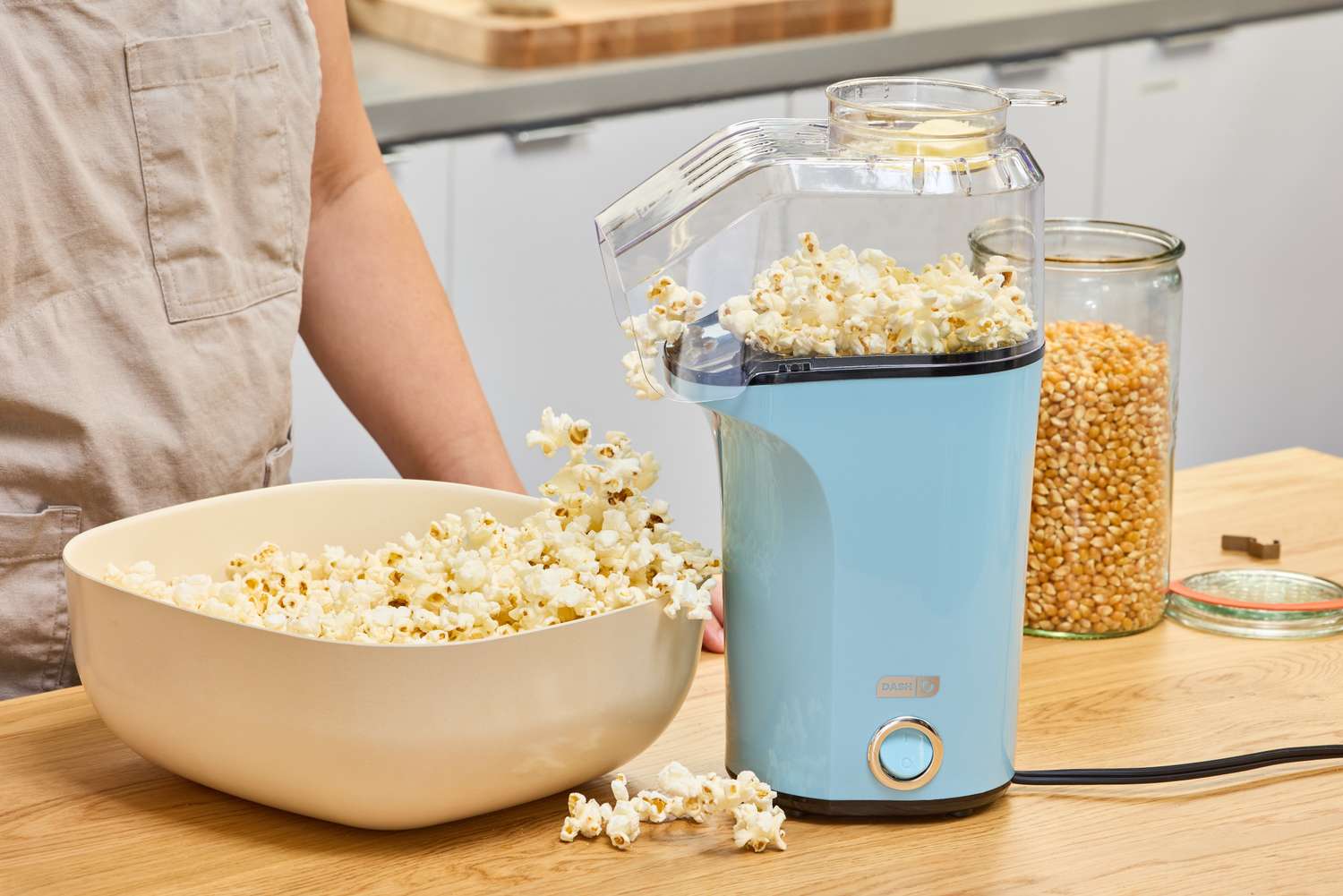 Popcorn is popped in the Dash Hot Air Popcorn Maker
