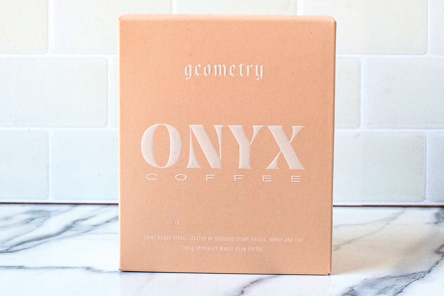 Box of Onyx Coffee Geometry blend on a countertop