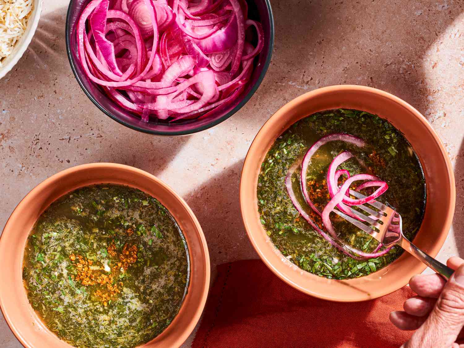 Molokhia soup in bowls.