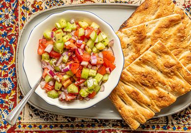 Overhead view of Shirazi salad with bread