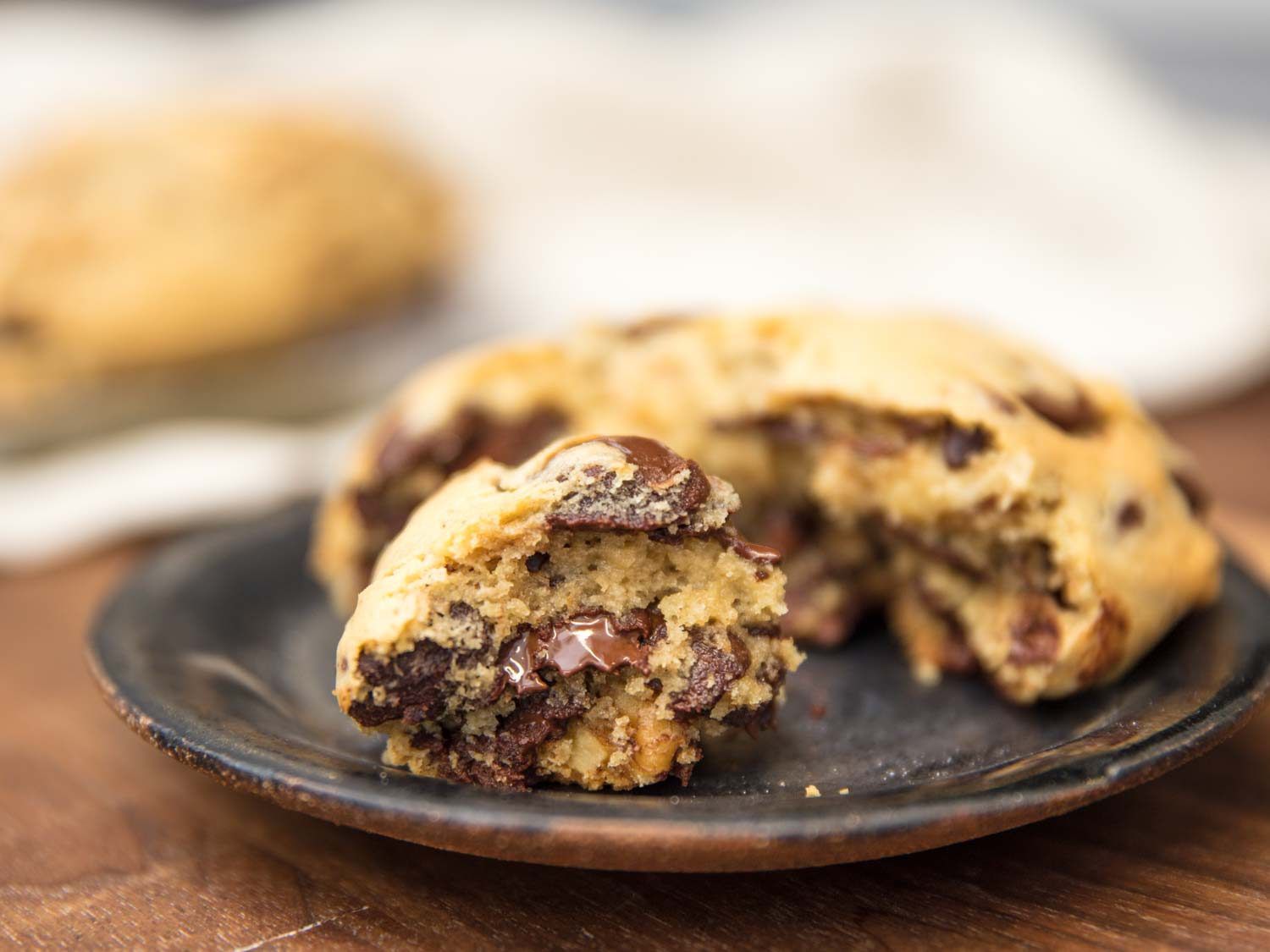 Levain Bakery-style super thick chocolate chip cookie on a plate.