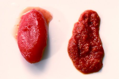 Photo showing the difference between a whole canned tomato and canned tomato purée.