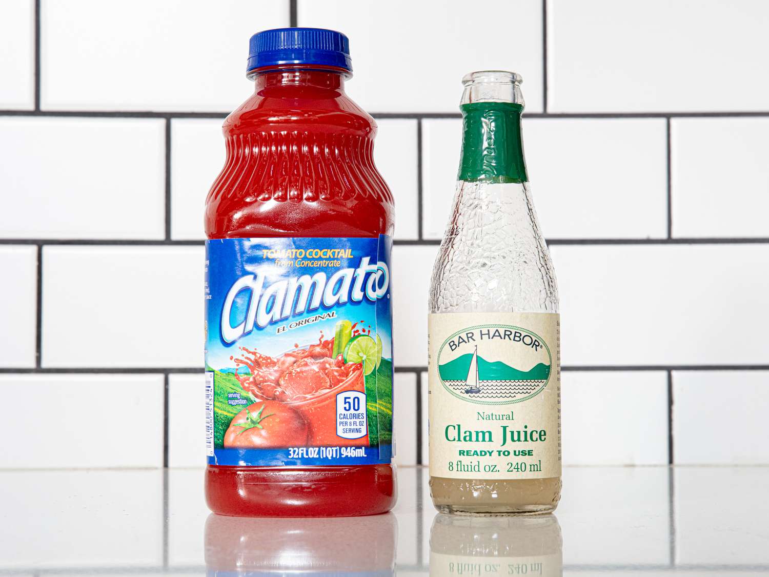 Side view of clamato and clam juice