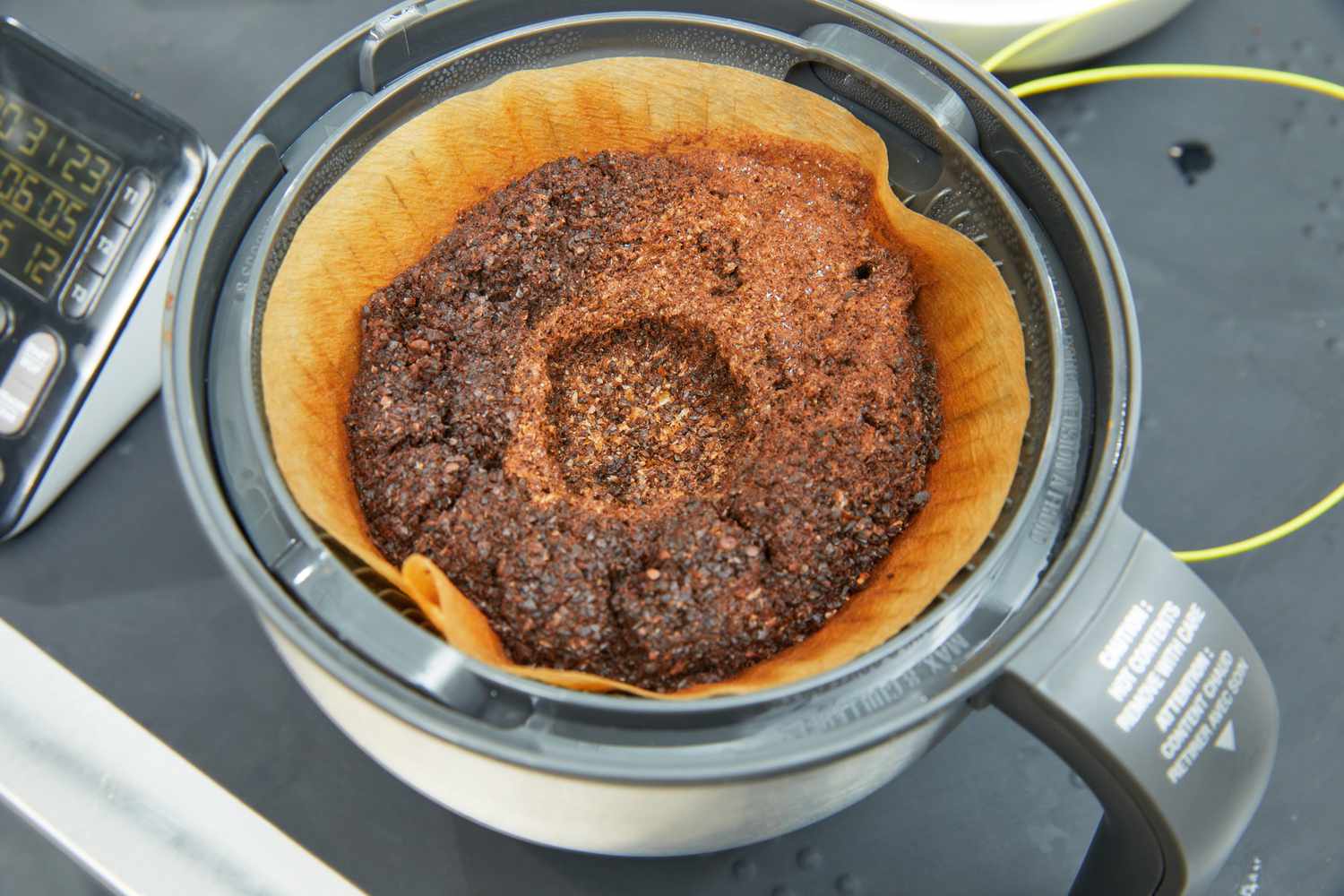 The coffee grounds left in the Breville Precision Brewer Thermal Coffee Maker