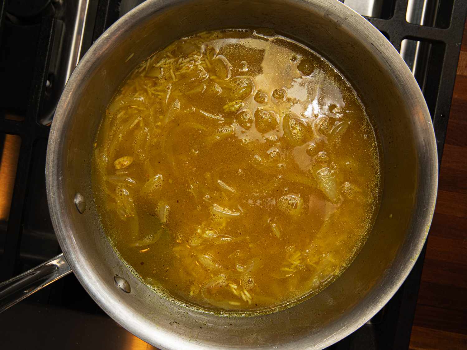 Overhead view of stock in pot