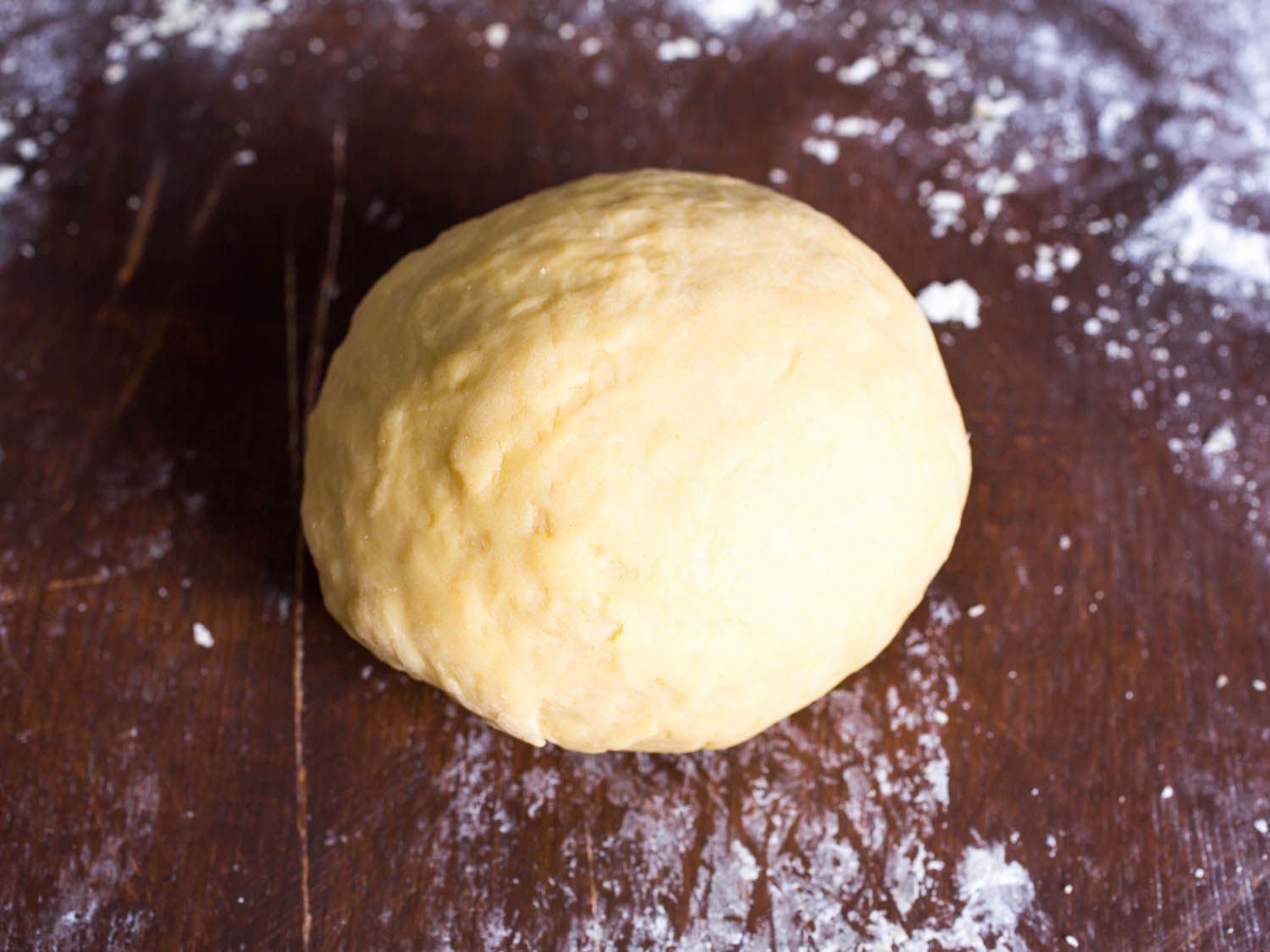 A firm ball of kneaded pasta dough.