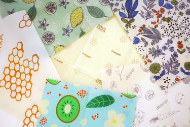 six pieces of beeswax reusable wrap layered on top of each other