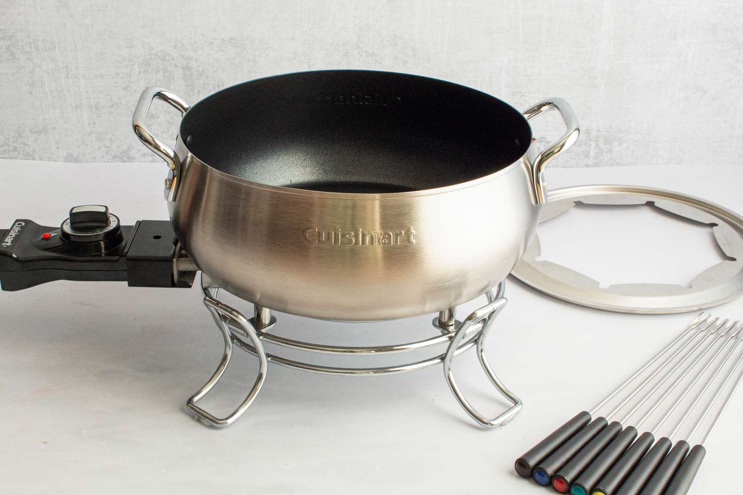 The Cuisinart fondue pot with its forks and fork ring.