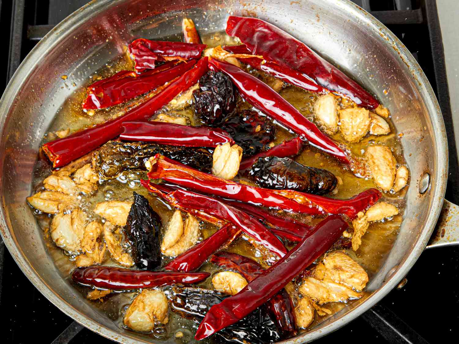 Overhead view of frying chiles