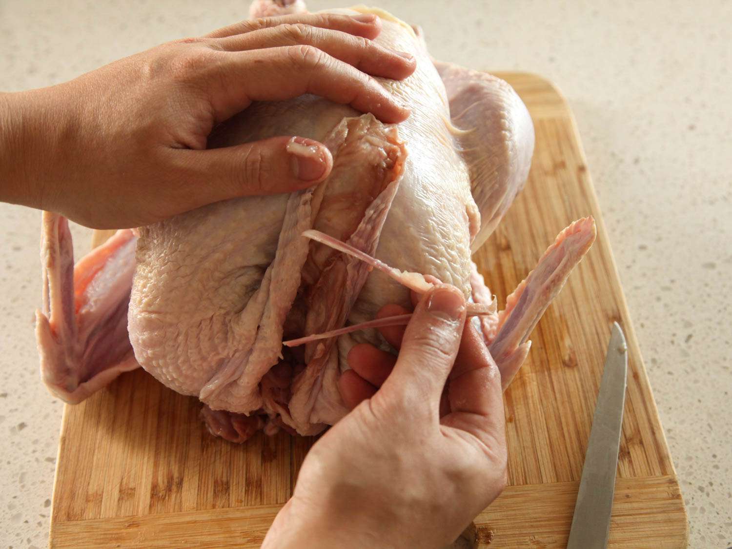 removing the wishbone from a raw turkey