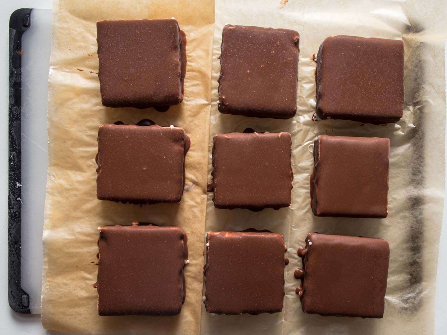 Overhead of a tray of freshly-made homemade Klondike Bars. 