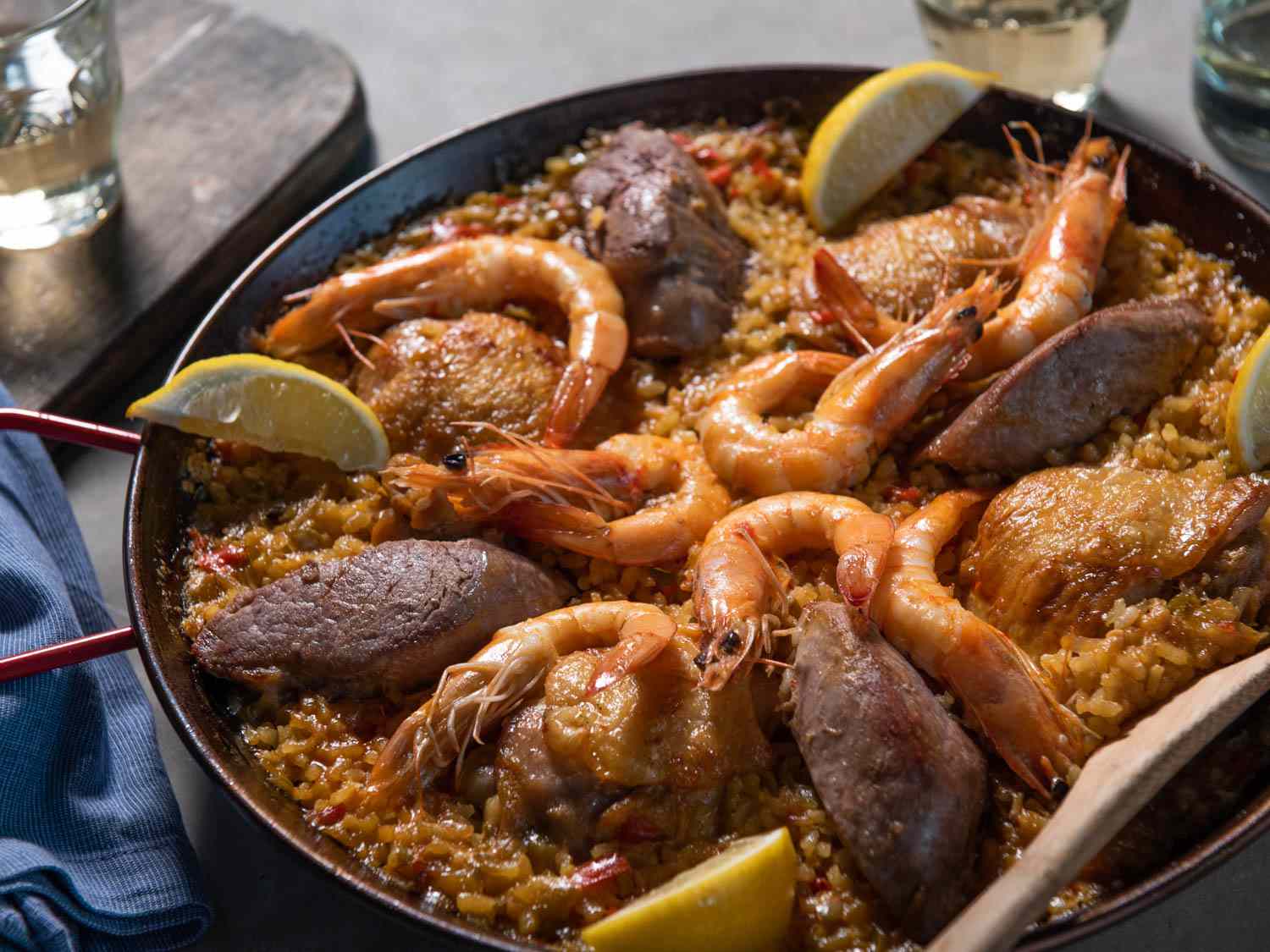 Stovetop paella mixta in a paella pan. 