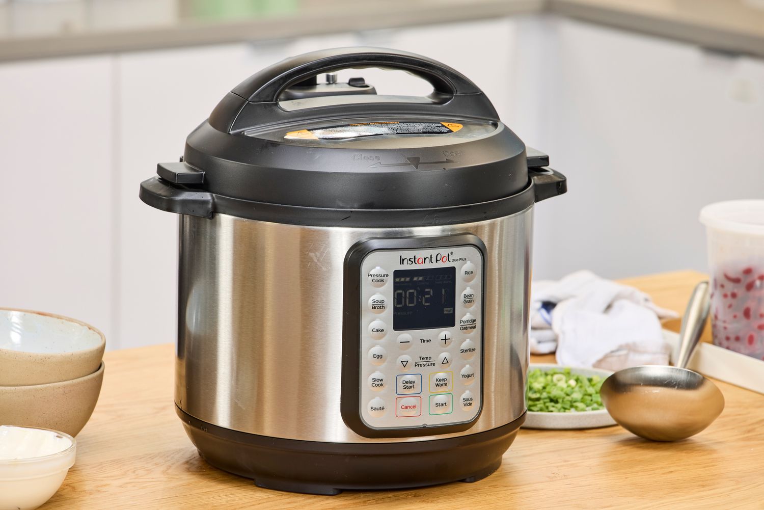 The Instant Pot Duo Plus 6-Quart 9-in-1 Pressure Cooker on a kitchen counter