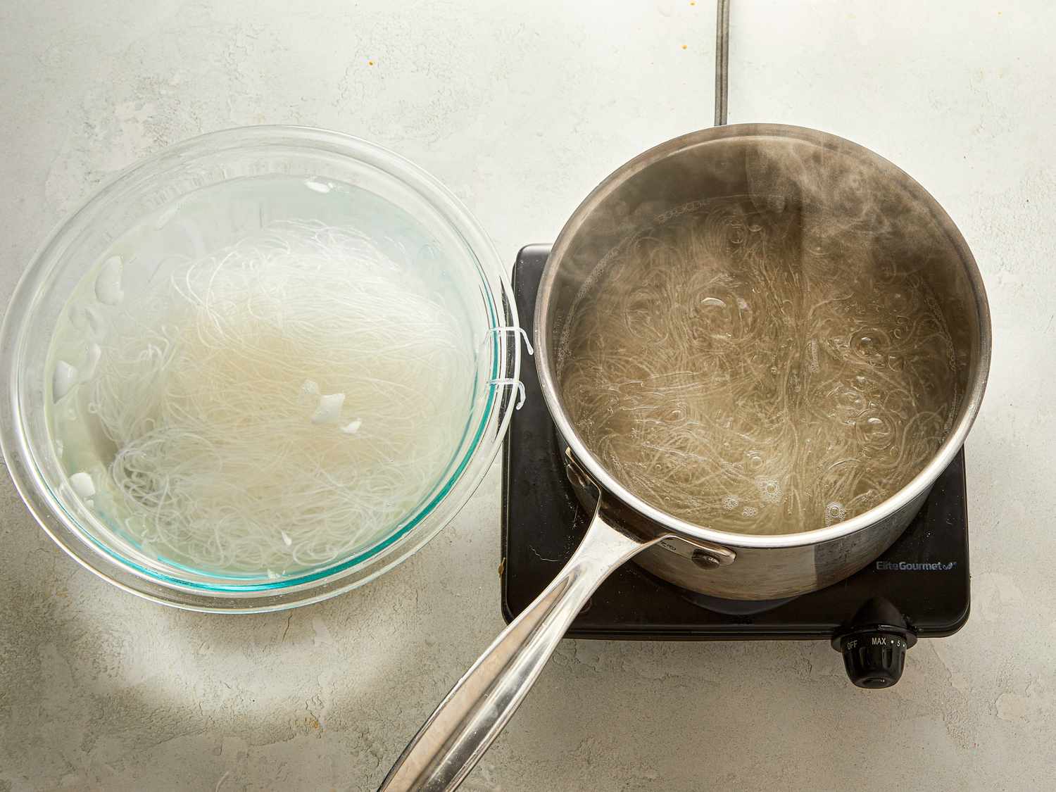 Glass noodles being soaked in a bowl and boiled in a pot on a stove preparation step for a recipe