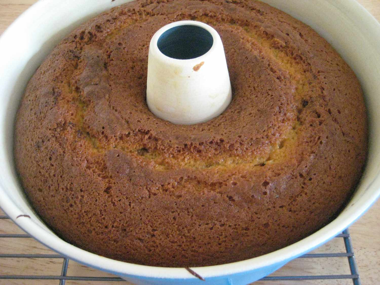 The baked cake, still in its tube pan.