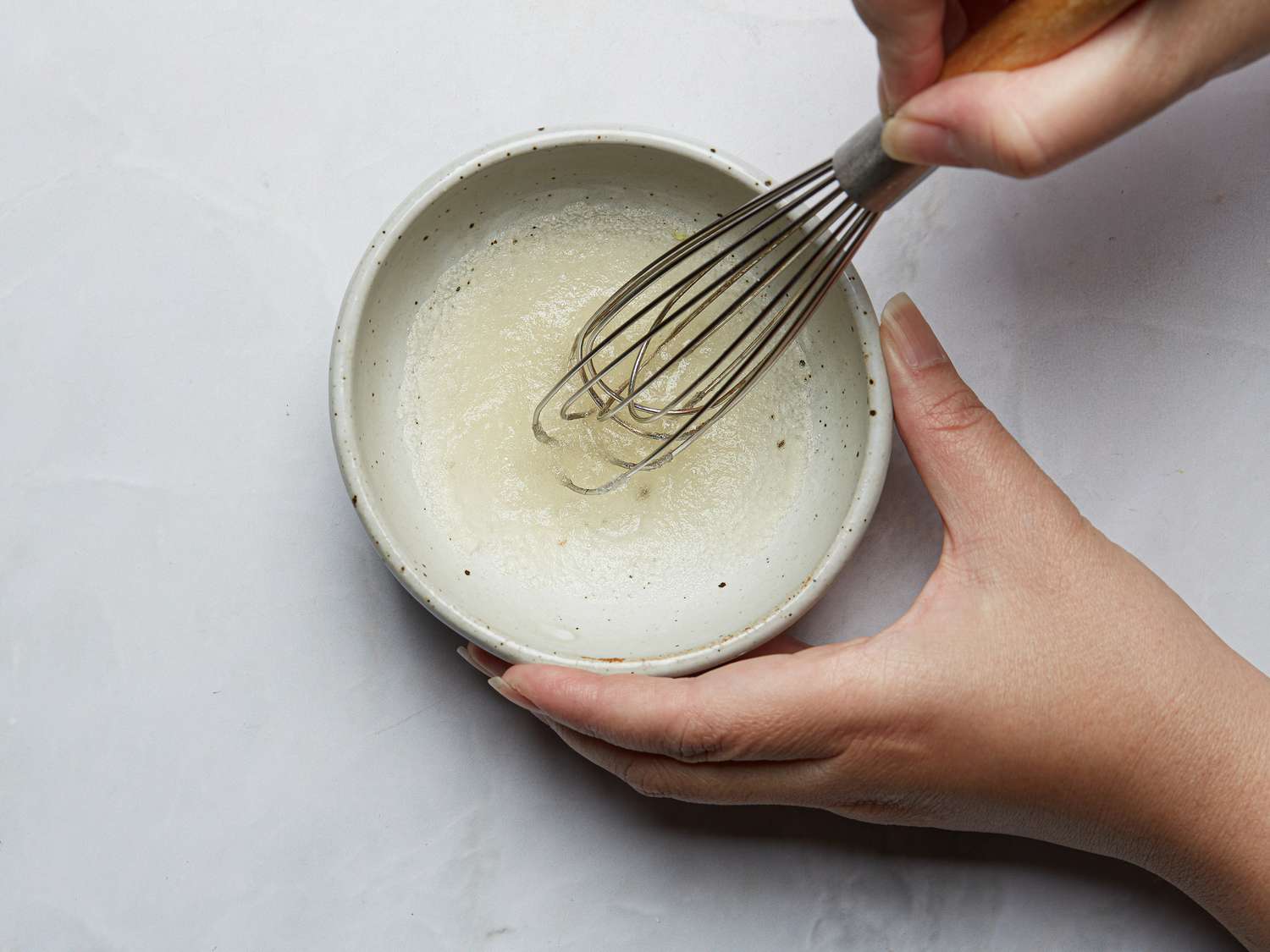 whisking gelatin in a small bowl