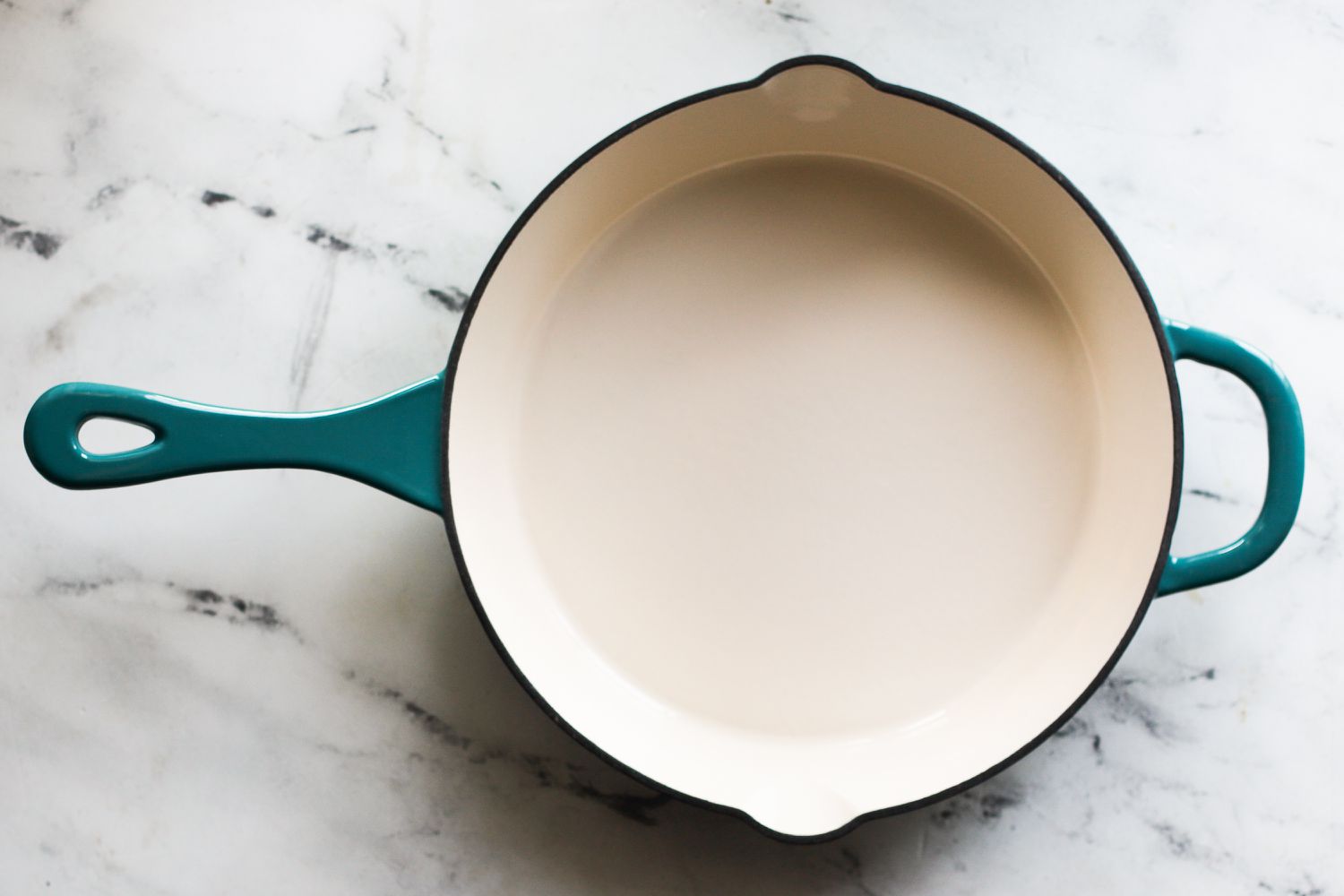 crock pot skillet on marble countertop
