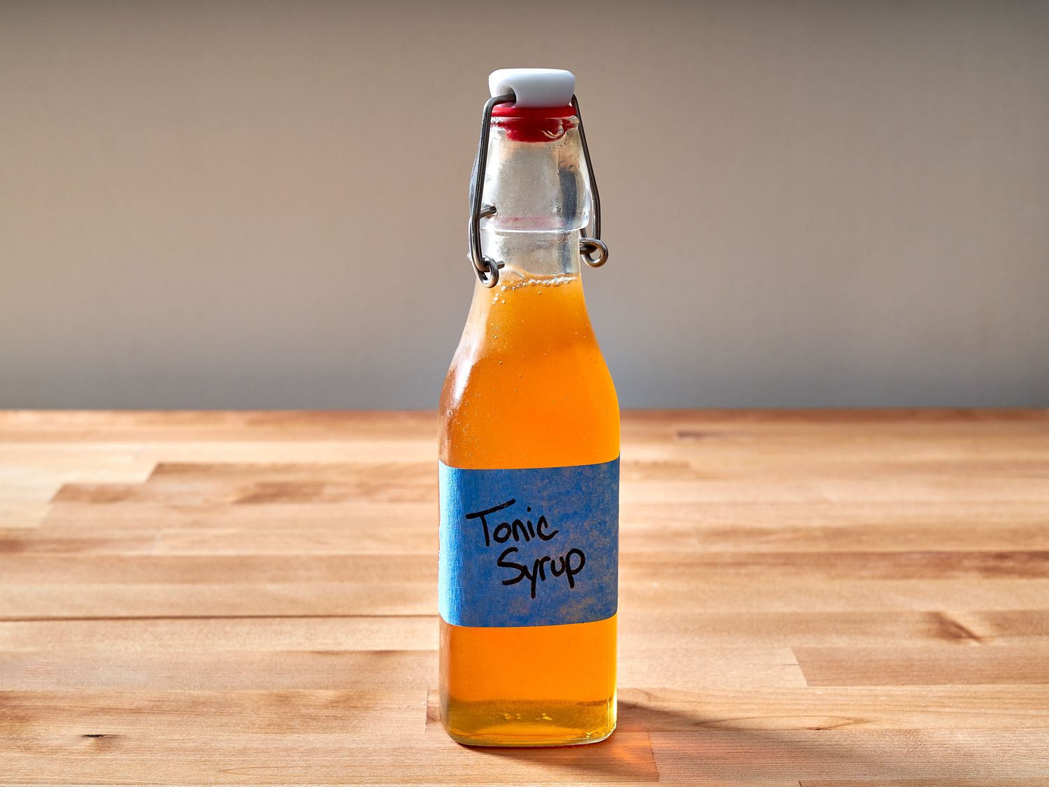 Tonic syrup in a sealed bottle.