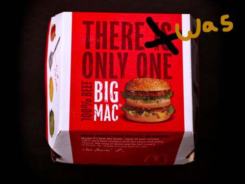 A package for a Big Mac, emblazoned with the tagline "there is only one Big Mac." The image has been edited to superimpose an X over "is." The word "was" is written nearby.