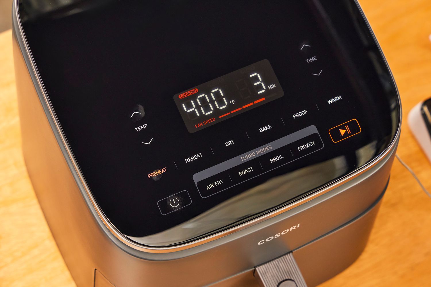 A digital control panel of an air fryer.