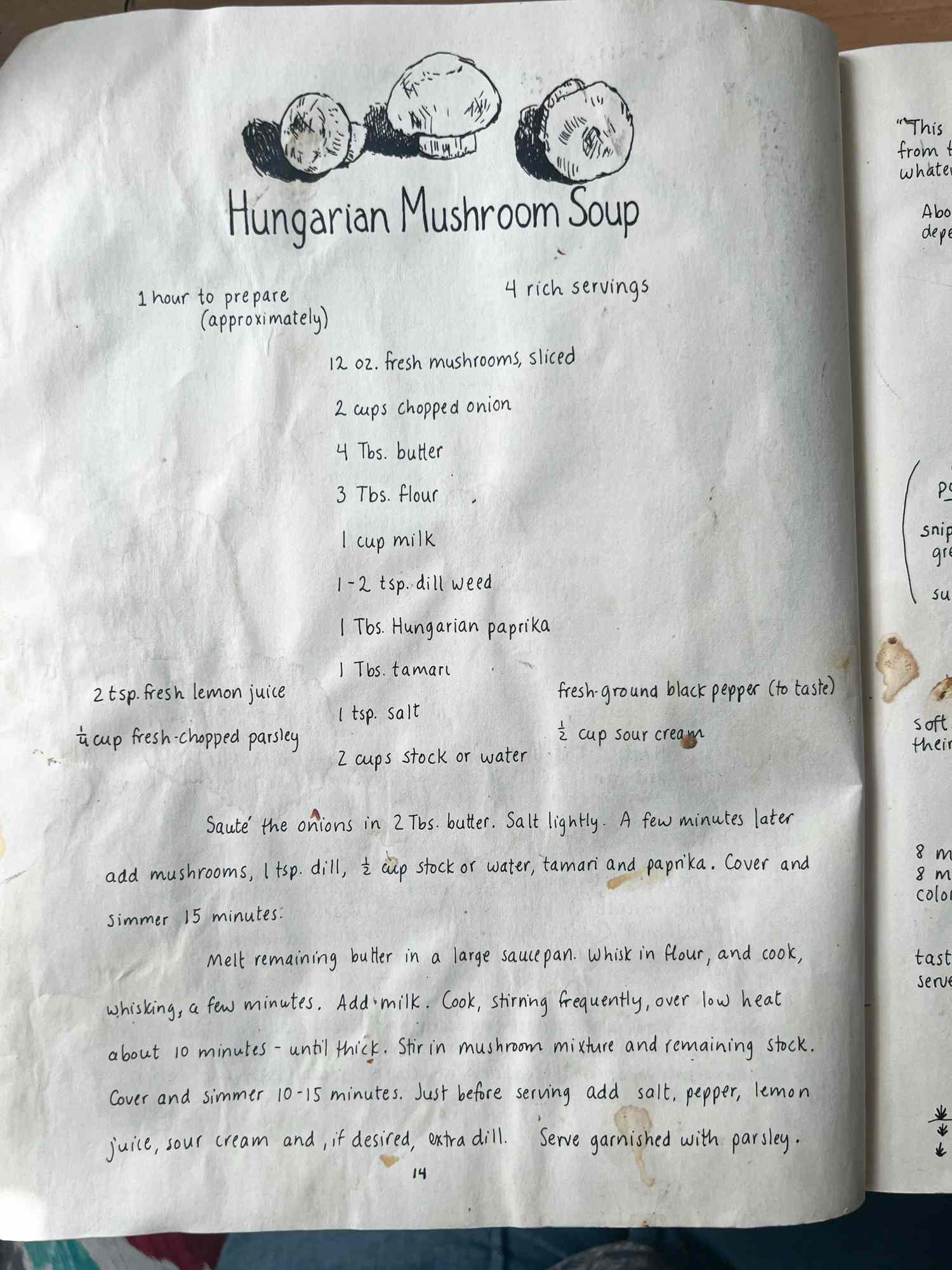 A handwritten recipe for Hungarian Mushroom Soup on an open page of a cookbook with an illustration of mushrooms at the top