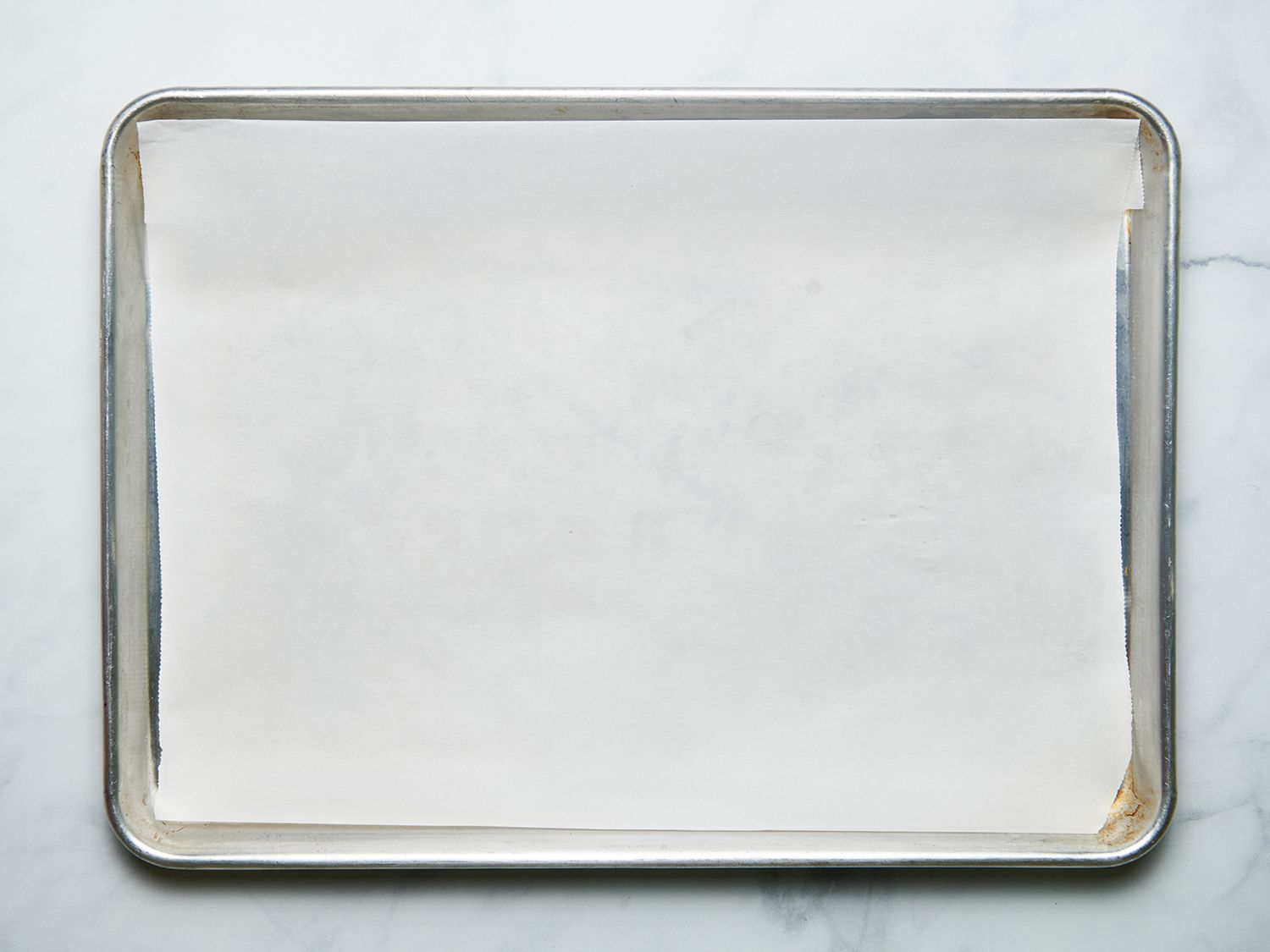 Parchment paper lined baking sheet 