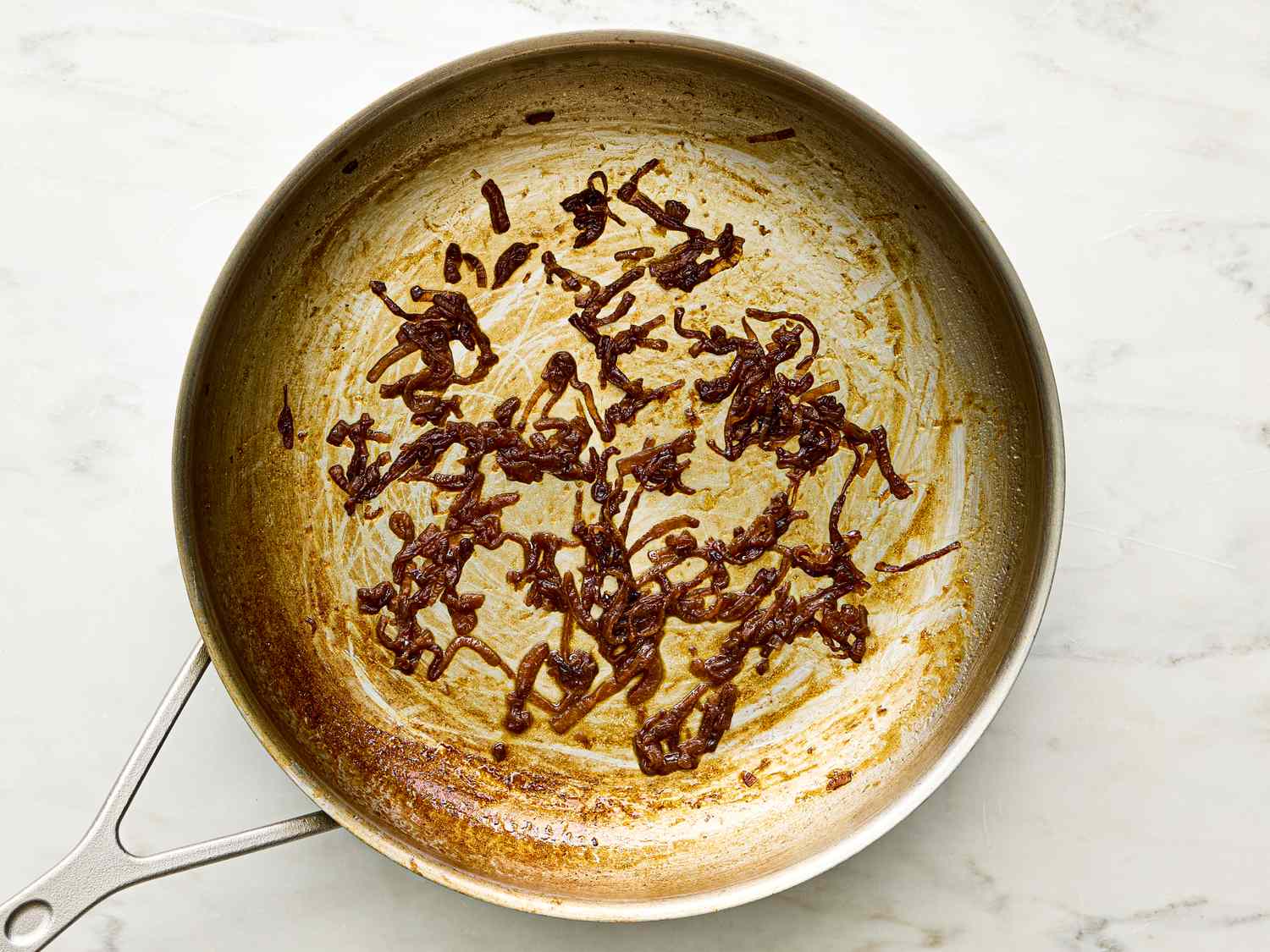 Caramelized onions in a frying pan