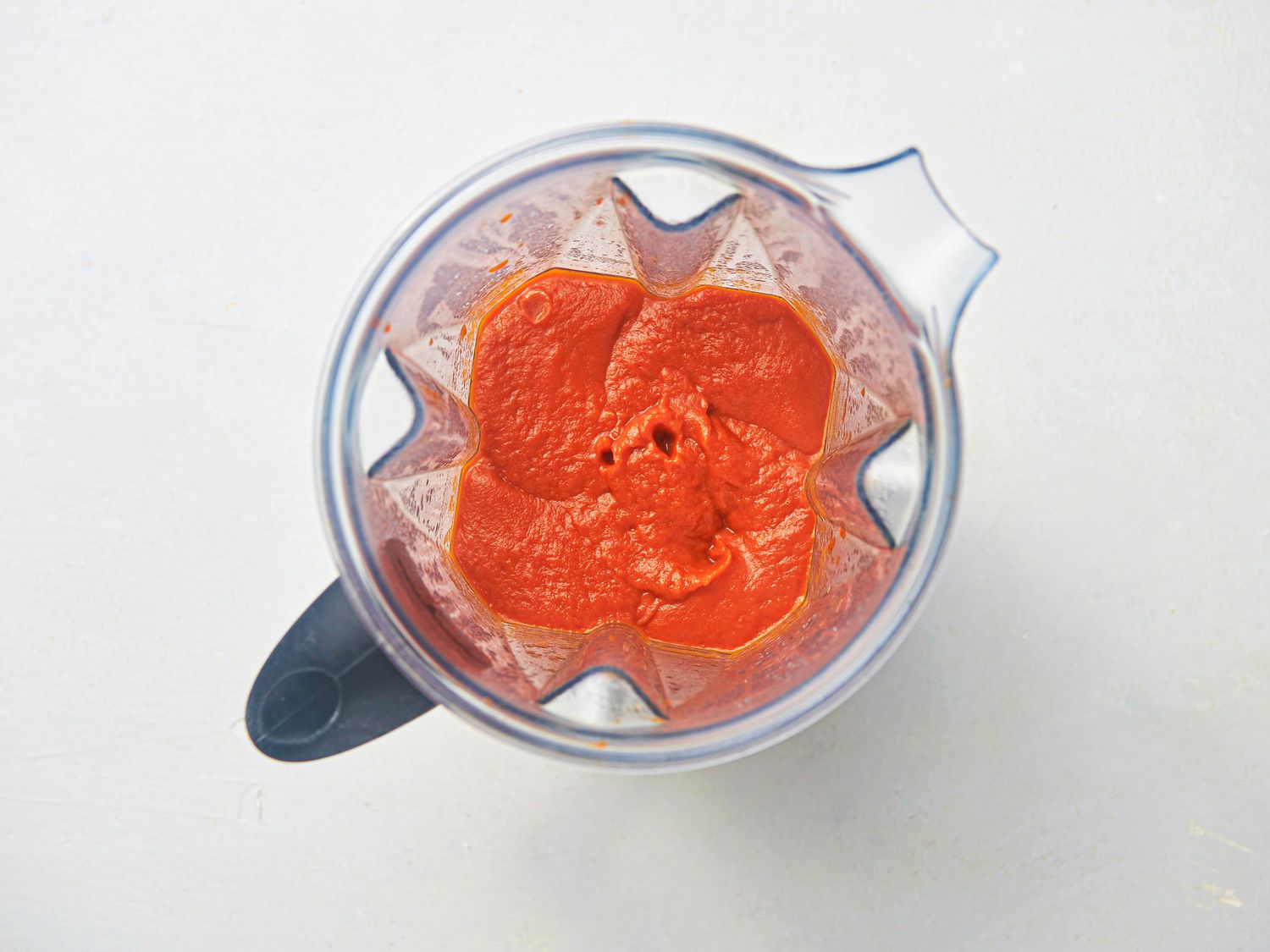 Overhead view of ketchup in a blender