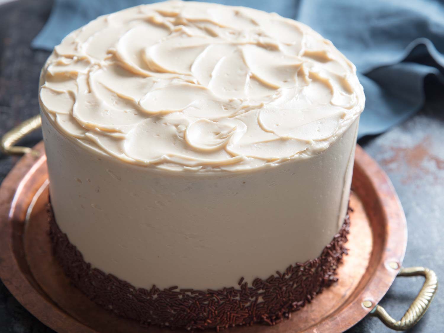 White cake frosted with Italian buttercream and chocolate sprinkles.