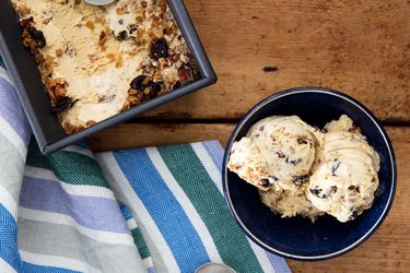 Oatmeal cookie ice cream in a bowl, scooped from a loaf pan 