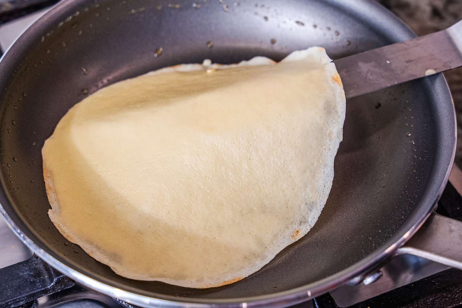A crepe cooking in the Tramontina 10-Inch Professional Aluminum Nonstick Restaurant Fry Pan