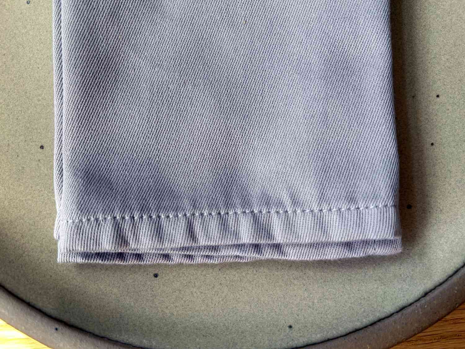 Close-up of a cloth napkin's stitching