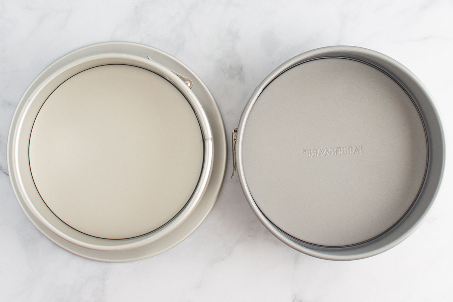 Two springform pans side-by-side.