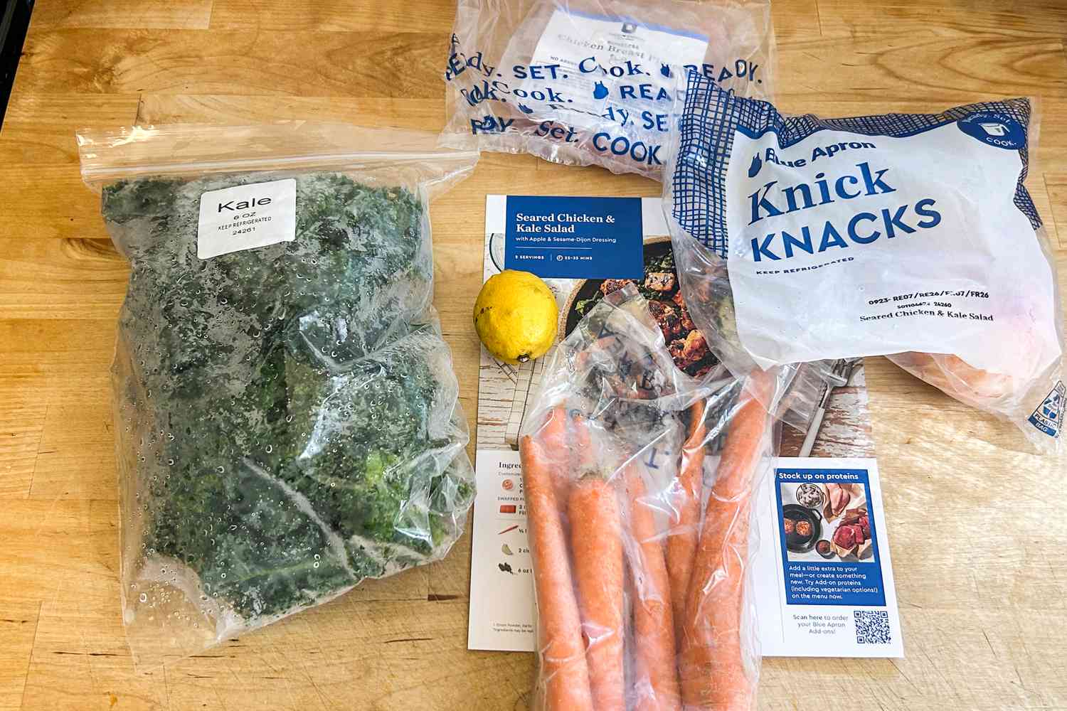 food in bags on a wooden countertop