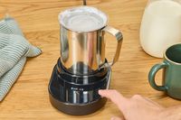 The Instant milk frother frothing milk.
