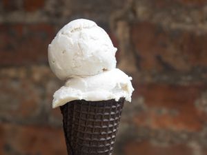 Scoops of taro ice cream on an ice cream cone