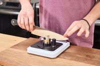 A person sharpens the Wüsthof Classic 8-Inch Chef's Knife