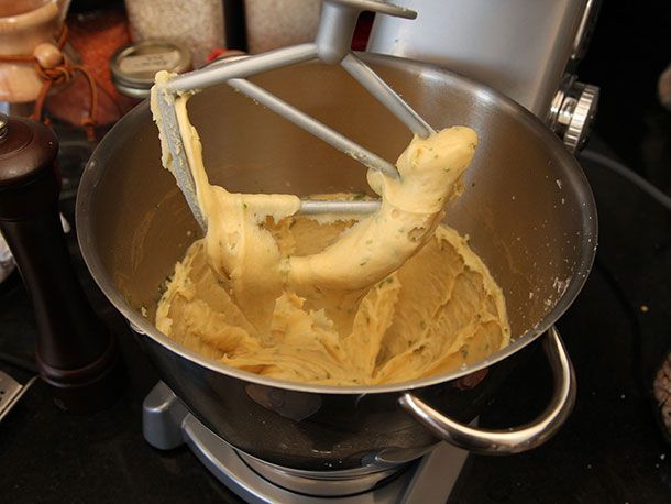 Dough being mixed in a stand mixer.