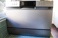 The Danby countertop dishwasher on a kitchen countertop.