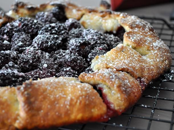Closeup of the finished galette, dusted with powdered sugar.