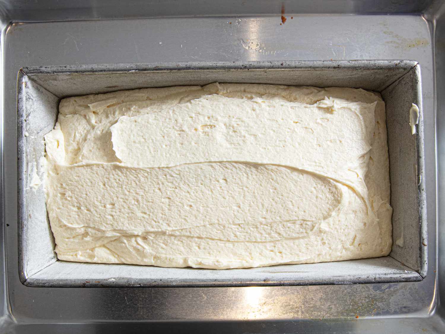 Overhead view of pound cake in pan