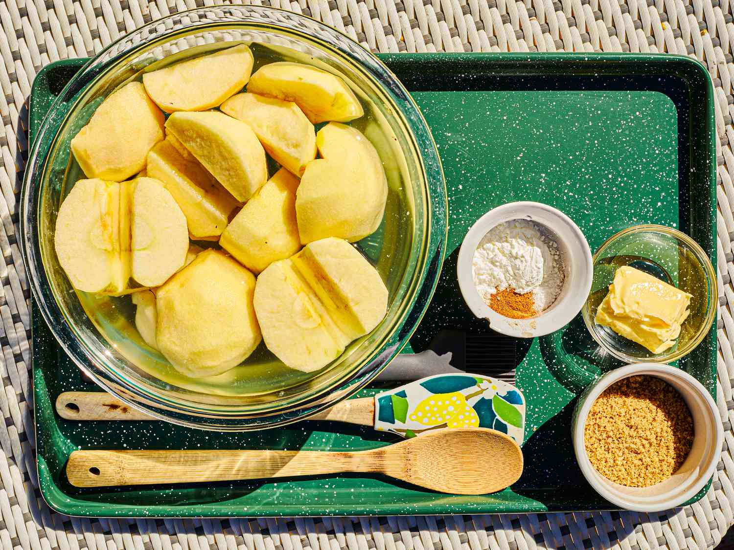 Overhead view of ingredients and tools for apple crisp